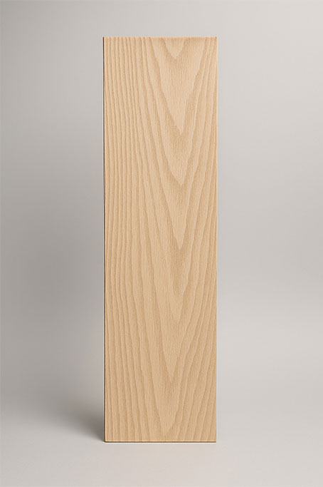 Wood plastic composite machine forming embossed surface textures